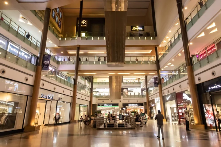 Shoppers in the multi-level atrium of Orion Mall at Brigade Gateway